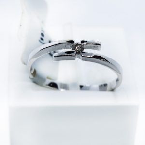 Anillo oro blanco con brillante cross